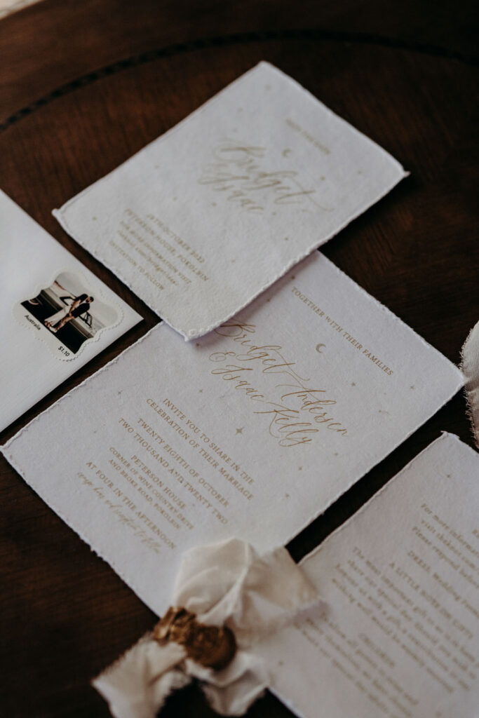 Deckled edge torn wedding invitations and custom wedding postage stamp