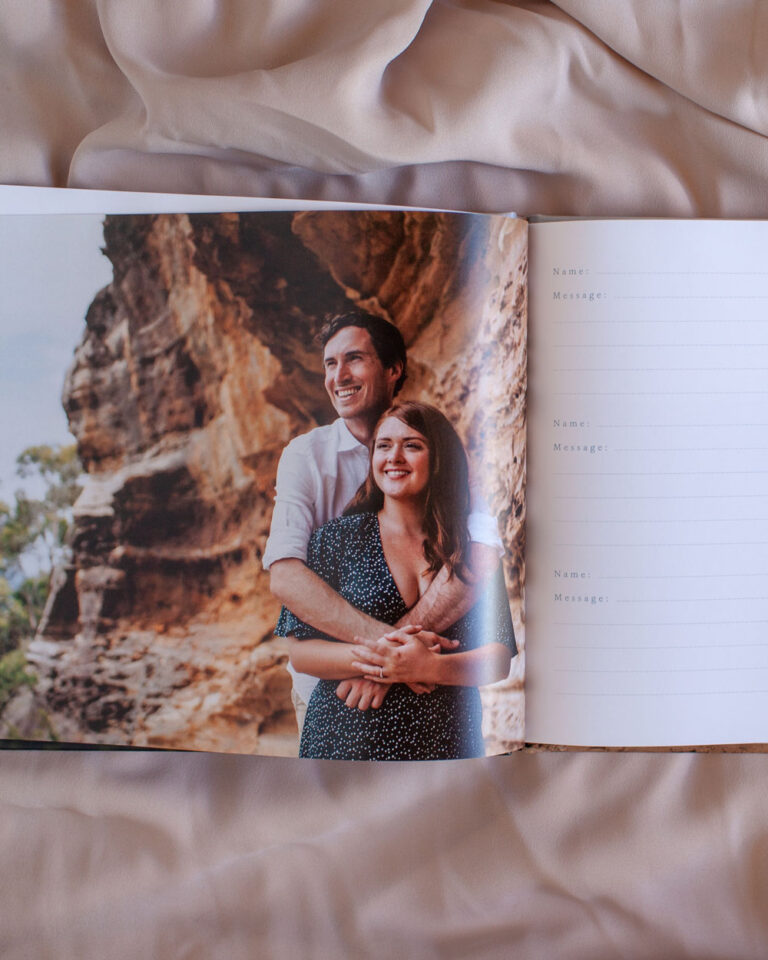 personalised wedding guest book with photos of the couple